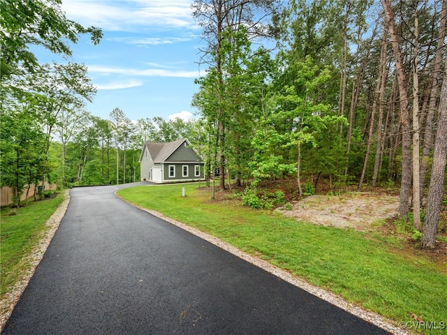 1270 Mill Quarter Rd, Powhatan, VA 23139 - view of front of property featuring a front yard, asphalt driveway, and a forest view