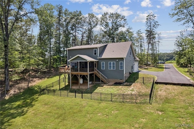 1270 Mill Quarter Rd, Powhatan, VA 23139 - back of house with a wooden deck, stairway, asphalt driveway, a fenced backyard, and a garage