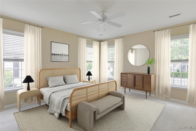 5027 Lewisetta Dr, Glen Allen, VA 23060 - bedroom with light colored carpet and a ceiling fan