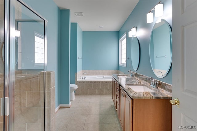 5027 Lewisetta Dr, Glen Allen, VA 23060 - bathroom featuring a bath, double vanity, tile patterned floors, and tiled shower