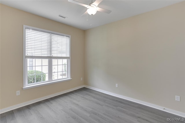 5027 Lewisetta Dr, Glen Allen, VA 23060 - empty room with dark wood finished floors and a ceiling fan