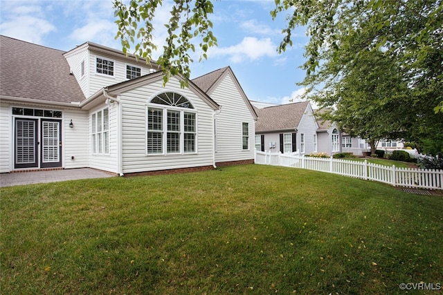 5027 Lewisetta Dr, Glen Allen, VA 23060 - back of house featuring roof with shingles