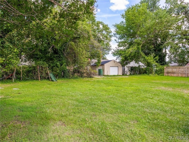 3825 Benton Ave, Henrico, VA 23222 - view of yard with a detached garage and an outdoor structure