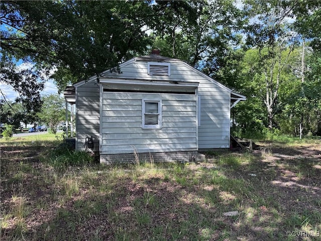 1601 N 25th St, Richmond, VA 23223 - view of side of home featuring an outbuilding