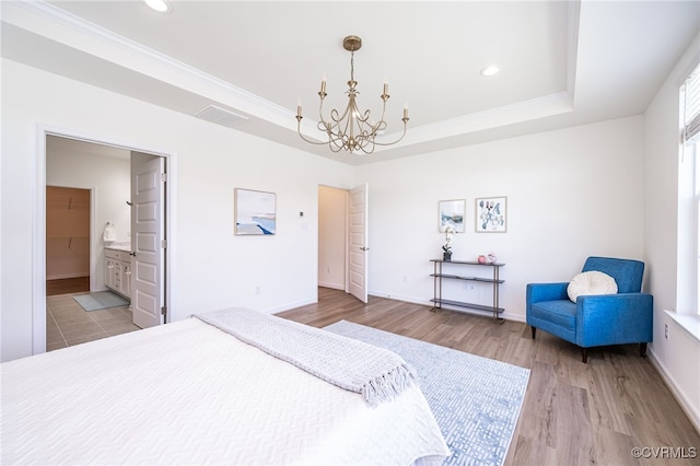 10698 Skippers St, Glen Allen, VA 23059 - bedroom with a chandelier, a raised ceiling, light wood-style floors, recessed lighting, and crown molding