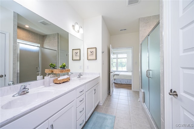 10698 Skippers St, Glen Allen, VA 23059 - ensuite bathroom featuring double vanity, a stall shower, and tile patterned flooring