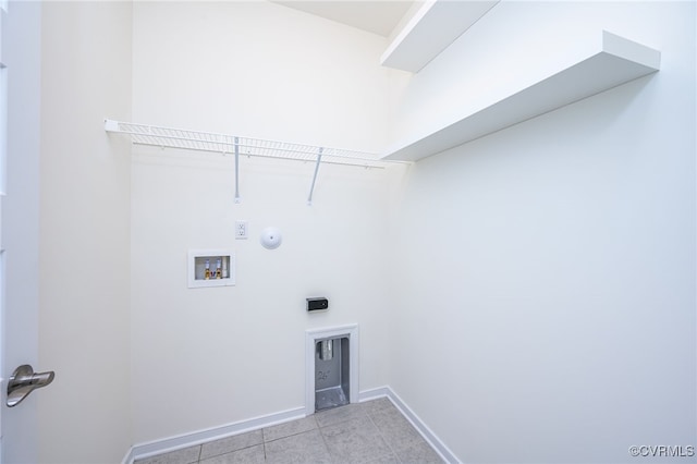 10698 Skippers St, Glen Allen, VA 23059 - laundry area with washer hookup, light tile patterned flooring, hookup for an electric dryer, and hookup for a gas dryer
