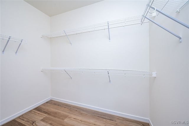 10698 Skippers St, Glen Allen, VA 23059 - spacious closet featuring wood finished floors