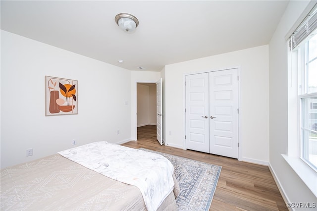 10698 Skippers St, Glen Allen, VA 23059 - bedroom featuring wood finished floors and a closet