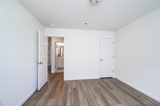10698 Skippers St, Glen Allen, VA 23059 - unfurnished bedroom featuring light wood finished floors