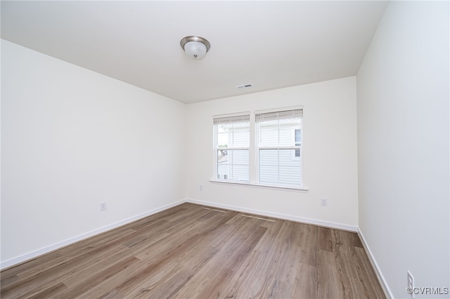 10698 Skippers St, Glen Allen, VA 23059 - spare room featuring wood finished floors and baseboards