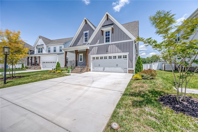 10698 Skippers St, Glen Allen, VA 23059 - view of front of house featuring board and batten siding, concrete driveway, roof with shingles, and an attached garage