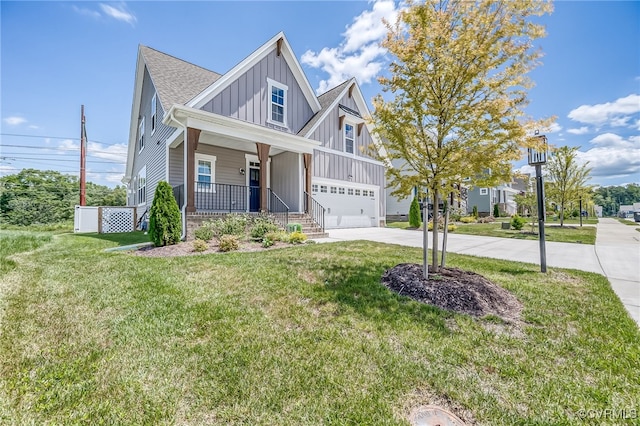 10698 Skippers St, Glen Allen, VA 23059 - view of front of house with board and batten siding, concrete driveway, a porch, a front yard, and an attached garage