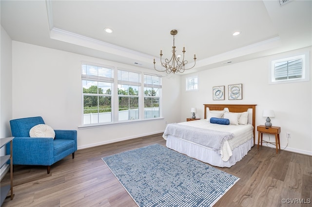 10698 Skippers St, Glen Allen, VA 23059 - bedroom with a tray ceiling, a chandelier, ornamental molding, wood finished floors, and recessed lighting