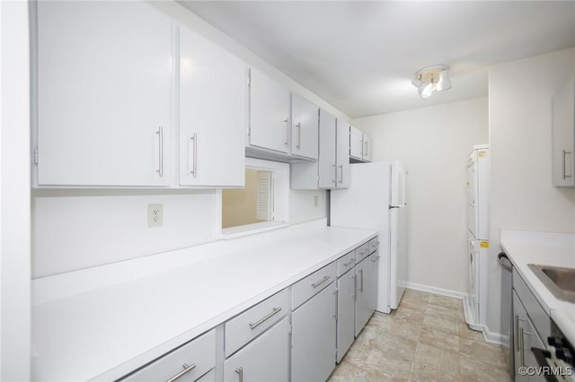 11808 N Briar Patch Dr, Midlothian, VA 22313 - kitchen featuring light countertops, freestanding refrigerator, and washer / clothes dryer
