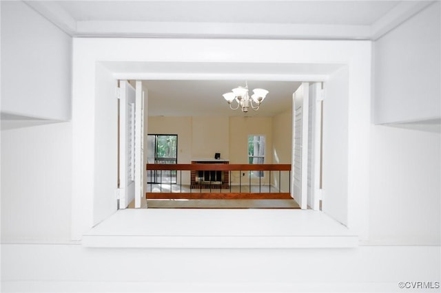 11808 N Briar Patch Dr, Midlothian, VA 22313 - corridor with a chandelier