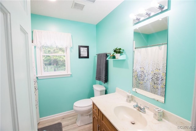 2851 Deer Run Dr, South Prince George, VA 23805 - bathroom with vanity, wood finished floors, and a shower with shower curtain