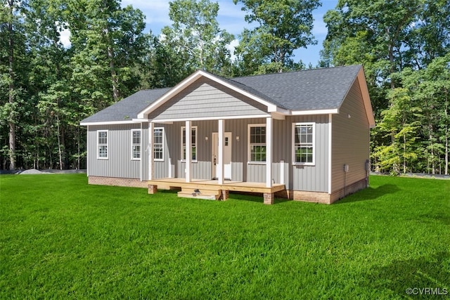 1007 Clement Town Rd, Powhatan, VA 23139 - view of front of home featuring a porch, a front yard, board and batten siding, crawl space, and roof with shingles