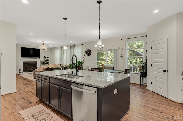 6112 Water Violet Ter, Moseley, VA 23120 - kitchen with dishwasher, light wood-style flooring, recessed lighting, light stone countertops, and hanging light fixtures