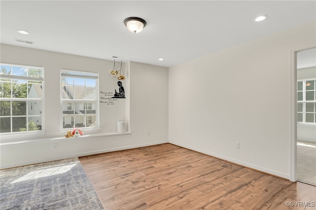 6112 Water Violet Ter, Moseley, VA 23120 - empty room featuring wood finished floors and recessed lighting