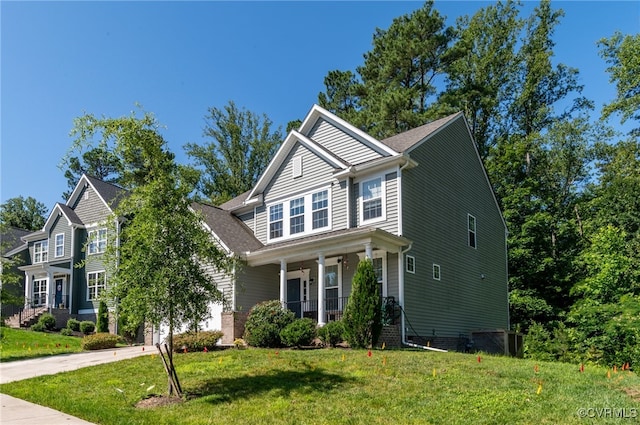 6112 Water Violet Ter, Moseley, VA 23120 - view of front of house with a porch, a front lawn, and driveway