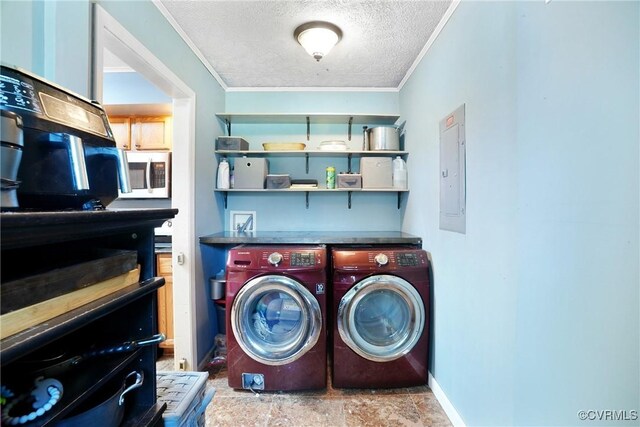 291 Briery Hills Dr, Meherrin, VA 23954 - laundry area with washing machine and clothes dryer, a textured ceiling, ornamental molding, and electric panel