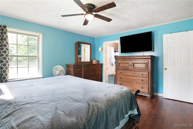 291 Briery Hills Dr, Meherrin, VA 23954 - bedroom featuring a textured ceiling, dark wood finished floors, ceiling fan, and ensuite bath