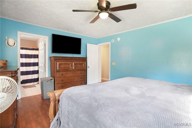 291 Briery Hills Dr, Meherrin, VA 23954 - bedroom with wood finished floors, a textured ceiling, a ceiling fan, and crown molding