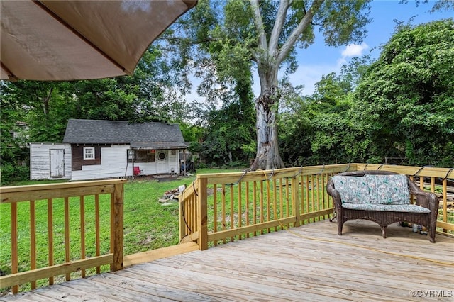 306 Hamilton Ave, Colonial Heights, VA 23834 - deck with an outbuilding, a lawn, and view of scattered trees