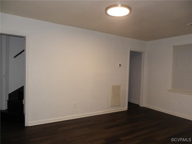 1504 N 30th St, Richmond, VA 23223 - empty room with dark wood-type flooring and baseboards