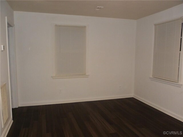 1504 N 30th St, Richmond, VA 23223 - unfurnished room with dark wood-style flooring and baseboards