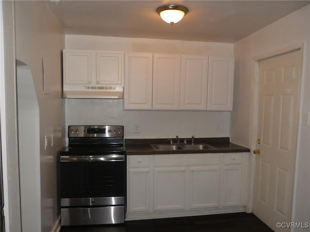 1504 N 30th St, Richmond, VA 23223 - kitchen featuring electric range, under cabinet range hood, white cabinetry, and dark countertops