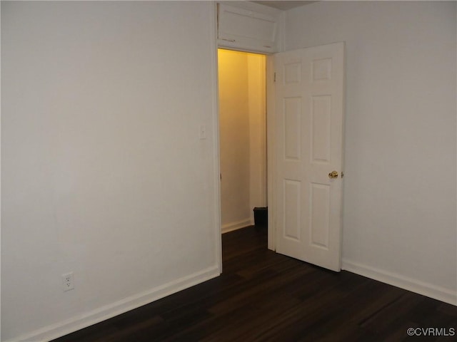 1504 N 30th St, Richmond, VA 23223 - spare room with dark wood-style floors and baseboards
