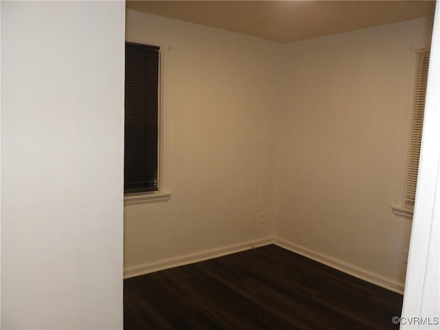 1504 N 30th St, Richmond, VA 23223 - unfurnished room featuring dark wood-style flooring and baseboards