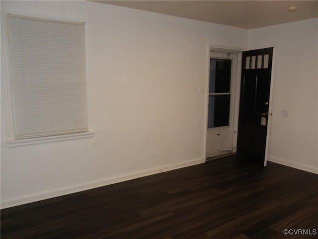 1504 N 30th St, Richmond, VA 23223 - unfurnished room with dark wood-style floors and baseboards