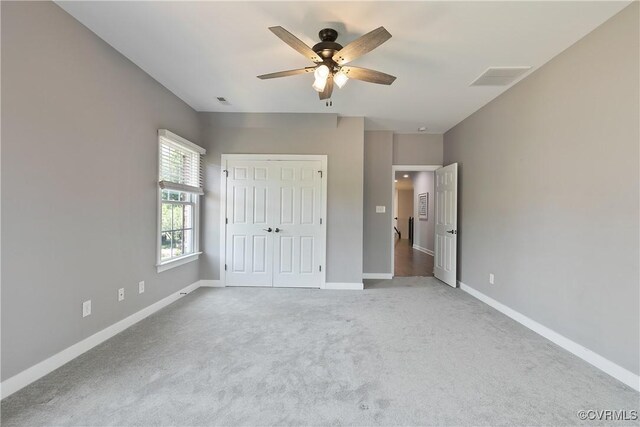 6430 Arwen Mews, Moseley, VA 23120 - unfurnished bedroom featuring light colored carpet, a closet, and a ceiling fan