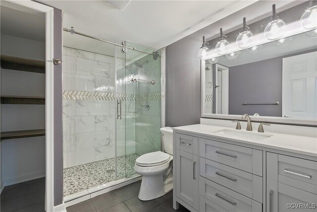 6430 Arwen Mews, Moseley, VA 23120 - bathroom featuring a shower stall, vanity, and tile patterned floors