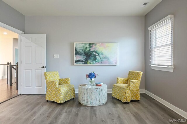 6430 Arwen Mews, Moseley, VA 23120 - sitting room with wood finished floors and baseboards