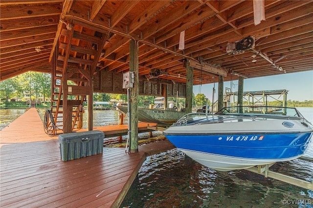 716 W Riverside Dr, Lanexa, VA 23089 - dock featuring boat lift and a water view