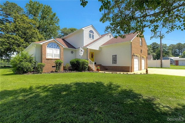 716 W Riverside Dr, Lanexa, VA 23089 - view of front of property featuring brick siding, driveway, a front yard, and an attached garage