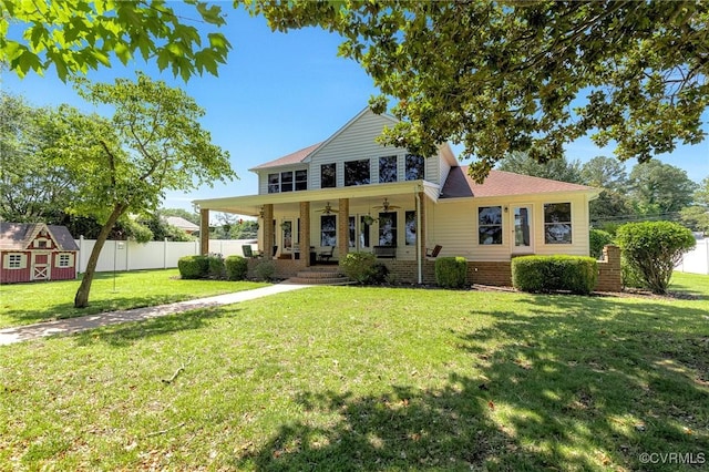 716 W Riverside Dr, Lanexa, VA 23089 - view of front of house with a porch, a storage unit, and a ceiling fan