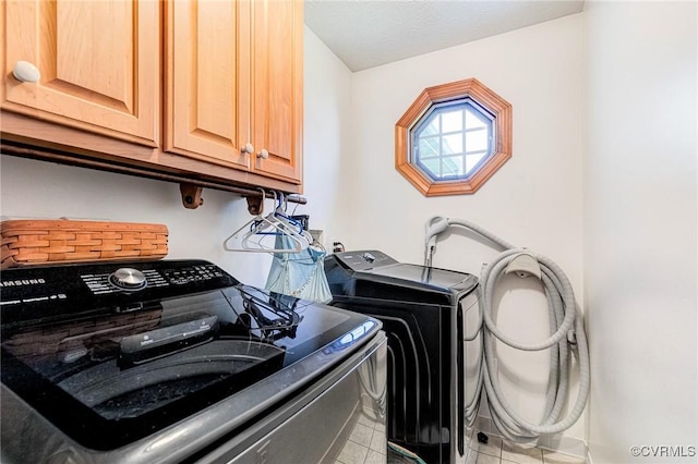 716 W Riverside Dr, Lanexa, VA 23089 - washroom with tile patterned floors, cabinet space, and washer and clothes dryer