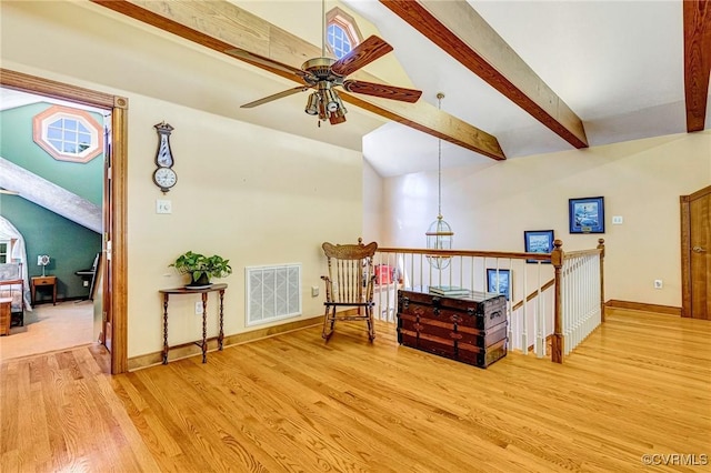 716 W Riverside Dr, Lanexa, VA 23089 - living area featuring wood finished floors, ceiling fan, and an upstairs landing