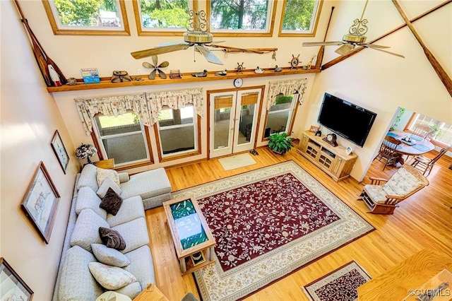 716 W Riverside Dr, Lanexa, VA 23089 - living area featuring a ceiling fan, a towering ceiling, and healthy amount of natural light