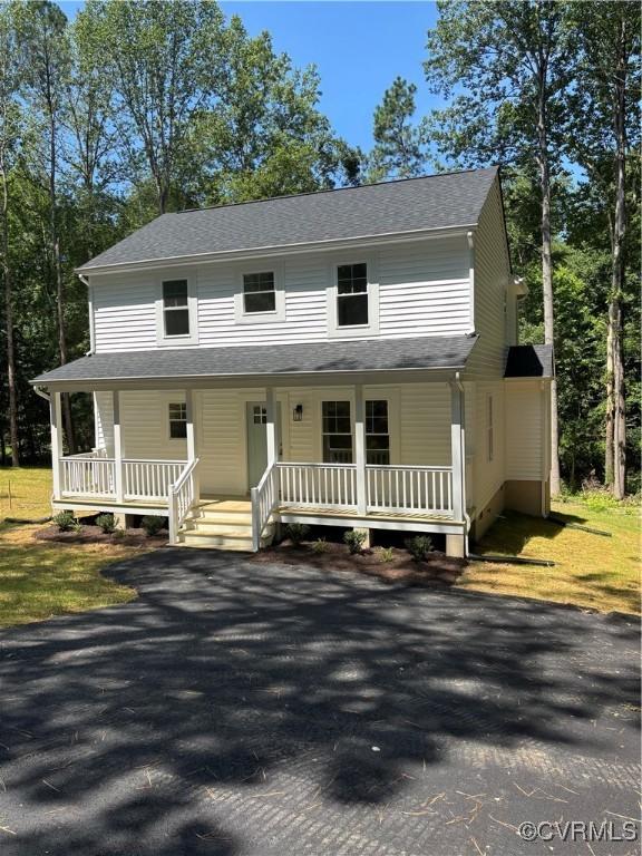 4006 Chesdin Blvd, Sutherland, VA 23885 - farmhouse-style home featuring covered porch and roof with shingles