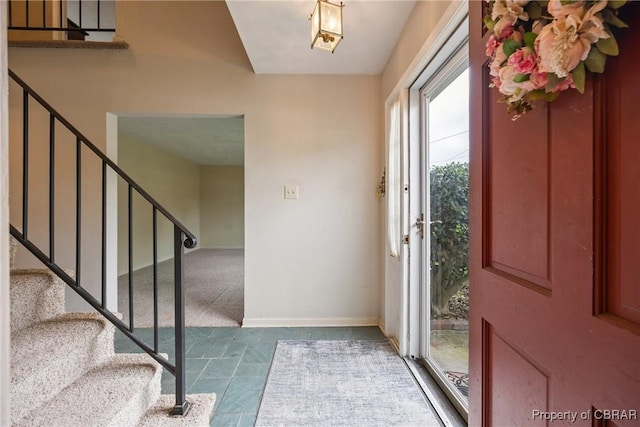 16 Diggs Dr, Hampton, VA 23666 - tiled foyer with stairway and carpet floors