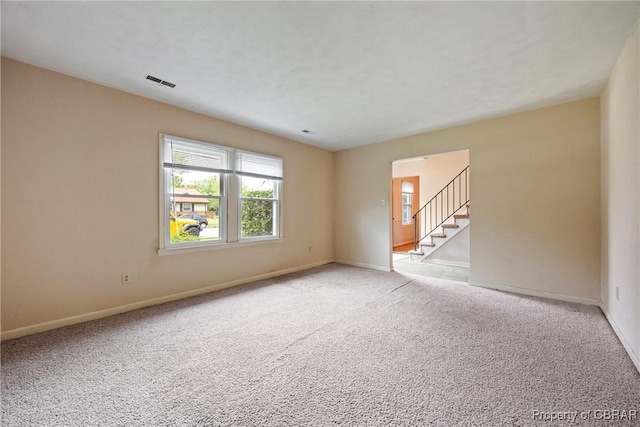 16 Diggs Dr, Hampton, VA 23666 - unfurnished room featuring light carpet and stairs