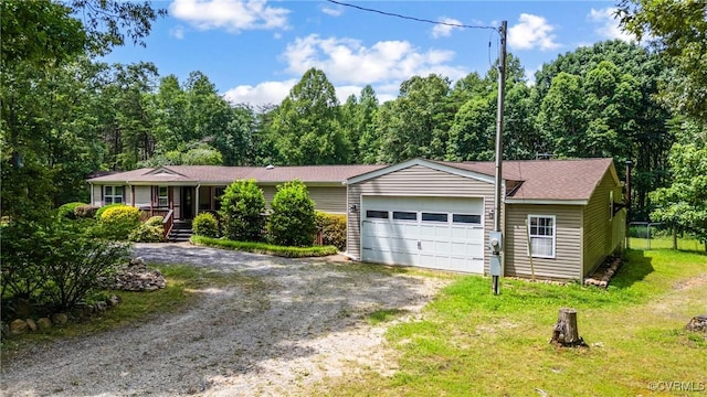 454 Elam Forest Dr, Prospect, VA 23960 - single story home with dirt driveway, an attached garage, a front lawn, and covered porch