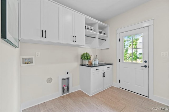 TBD Cedar Lane, Glen Allen, VA 23059 - laundry room with hookup for an electric dryer, washer hookup, cabinet space, and light wood-style flooring