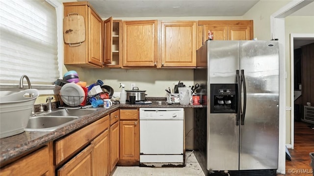 17 E 31st St, Richmond, VA 23224 - kitchen featuring stainless steel fridge, dishwasher, and glass insert cabinets